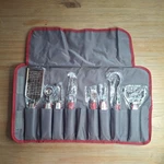 Wolfgang Puck 8-PIECE Garnish & Kitchen Prep Set Stainless Steel W/ Roll-up Case. Fixed Price $14.99.