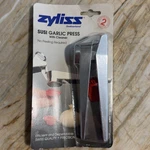 New Vintage Zyliss Susi Garlic Press Made Switzerland Cadmium-free Aluminum. Fixed Price $49.97.