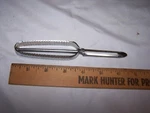 Vintage Metal Hand Potato / Vegetable Peeler Marked Jr Inside Crown Japan. Fixed Price $12.00.