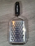Microplane Gourmet Series Ultra - Course Grater / Zester Black Handle. Fixed Price $7.99.