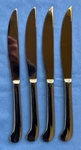Set Of Four Oneida Post Road / Pointe Royal Stainless Steel Steak Knives. Fixed Price $19.95.