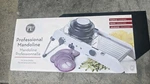 Progressive International PL8 Mandoline Slicer, White New. Fixed Price $49.99.