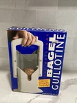 Larien Products Bagel Biter Cutter The Original Guillotine SLICER(DR5). Fixed Price $19.99.