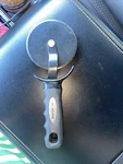 Farberware Professional Non-stick Pizza Cutter BLACK9-1/4. Fixed Price $9.99.