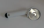 Tupperware Pizza Wheel Pastry Dough Stainless Cutter White Green Tip Vtg 2877. Fixed Price $9.99.
