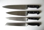 Set Of Henckels Stainless Knives, 9" & 7 3/4" Chefs Bread. Fixed Price $45.00.