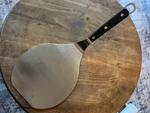 Fox Run Stainless Steel Pizza Peel Black Plastic Handle Cooking Utensil. Fixed Price $10.00.