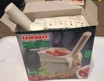 Leifheit Cherrymat Pitter With Stone Catcher. Not Used. Box Is Ripped.. Fixed Price $30.00.
