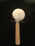 Sassafras Enterprises Pizza Cutter 6.5IN. Fixed Price $8.50.