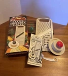Vintage Mandolin Chefs Secrets Grater-shredder-slicer With Extras. Fixed Price $17.00.