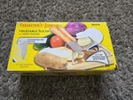 New In Box Feemster's Famous Vegetable Slicer And Safety Holder. Fixed Price $35.99.