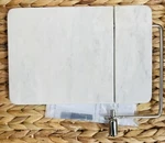 9" X 6" Marble Cheese Slicer Cutting Board White - Threshold. Fixed Price $30.00.