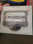 New Target Bullseye Playground High Fidelity Cassette Tape Pizza Cutter. Fixed Price $13.34.