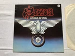 Saxon Wheels Of Steel, Vinyl Lp CAL115 1980 Utopia Press.. Fixed Price $17.45.