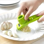 Mini Garlic Grinder Manual Press Crusher Kitchen Mincer Tool Gadget. Fixed Price $12.00.
