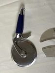 Blue Kitchenaid Professional Empire Pizza Cutter Wheel Finger Guard. Fixed Price $34.00.