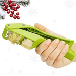 Garlic Slicer And Mincer Press With Stainless Steel Blades Easy Clean Compact. Fixed Price $11.38.
