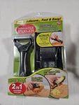 Miracle Peeler 2-IN-1 Dual Blade Julienne Slicer Vegetable Mandoline Nip. Fixed Price $14.99.