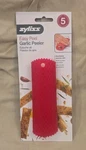 Zyliss Easy Red Silicone Garlic Peeler 5.5" - New In Package. Fixed Price $6.00.