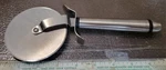 Oneida Rolling Stainless Steel Pizza Wheel Cutter 3.5 In. 9.25" Length. Fixed Price $13.75.