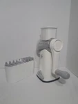 X-home 5-IN-1 Rotary Cheese Grater Manual Hand Crank Shredder, White. Fixed Price $19.96.