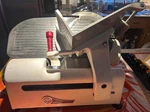 Globe C1620 Commercial Meat Slicer W. Built-in Sharpener. Fixed Price $950.00.