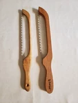 2 Vintage Beautiful Wooden Handle Fiddle Bow Bread Slicing Knife 15" 14". Fixed Price $20.00.