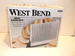 West Bend Folding Bread Slicing Guide 6600X 1-2 Lb Loaves W/box. Fixed Price $14.09.