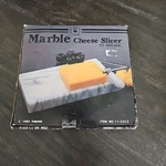 Marble Cheese Slicer New Box With 2 Replacement Wires Included. Fixed Price $28.00.