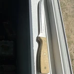 The Cook's Boyer Slicer Meat Knife Straight Edge Stainless Steel Wood Handle. Fixed Price $17.00.