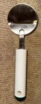 Vintage Tupperware 3192A Cheese Plane 9-1/2" Slicer White W/ Green. Fixed Price $19.97.