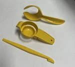Vintage Tupperware Yellow Yolkster Egg Lifter Citrus Peeler #779 #727-9 #1334-4. Fixed Price $6.49.