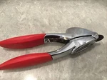 Trudeau Garlic Press, Red Preowned. Fixed Price $35.00.