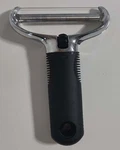 Oxo Good Grips Wire Cheese Slicer Comfort Handle. Fixed Price $14.04.