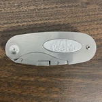 Mac Tools Folding Utility Knife Box Cutter, Steel Blade, Metal Handle, Silver. Fixed Price $46.99.
