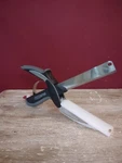 Preowned Clever Cutter 2 1 Scissors And Cutting Block Chopper/ Slicer Tool. Fixed Price $15.00.