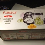 Fullstar 8-IN-1 Spiralizer Grater Juicer With Interchangeable Blades. Fixed Price $29.92.