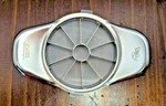 The Pampered Chef Apple Wedger Slicer Corer Stainless Steel With Cover #2427. Fixed Price $15.00.