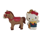 Blue Sky Clayworks - Hello Kitty Cowgirl Salt & Pepper Set 23460. Fixed Price $20.40.