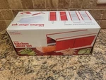 Wow! Handy Gourmet 5-IN-1 Kitchen Slicer Set, Grate, Slice, Transport/store New. Fixed Price $9.90.