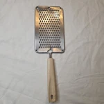 Vintage Ekco Stainless Steel Flat Grater Off White Handle Cheese Onion 11 Usa. Fixed Price $8.00.