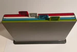 Pre-owned/used*joseph Upright Filing/index Storage Cutting Board Set Of 4. Fixed Price $33.33.