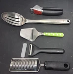Kitchen Utensil Set Grater Peeler Garlic Press Slotted Cooking Spoon Truffle 5PC. Fixed Price $15.29.