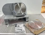 Lem Inch Meat Slicer - Silver New Model No. 1511. Fixed Price $79.99.