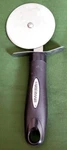 Handy 7" Farberware Pizza Cutter Wheel. Fixed Price $6.76.