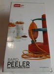 Dash Go Rapid Peeler Red Apple One Touch Electronic With 3 Blades. Fixed Price $24.00.